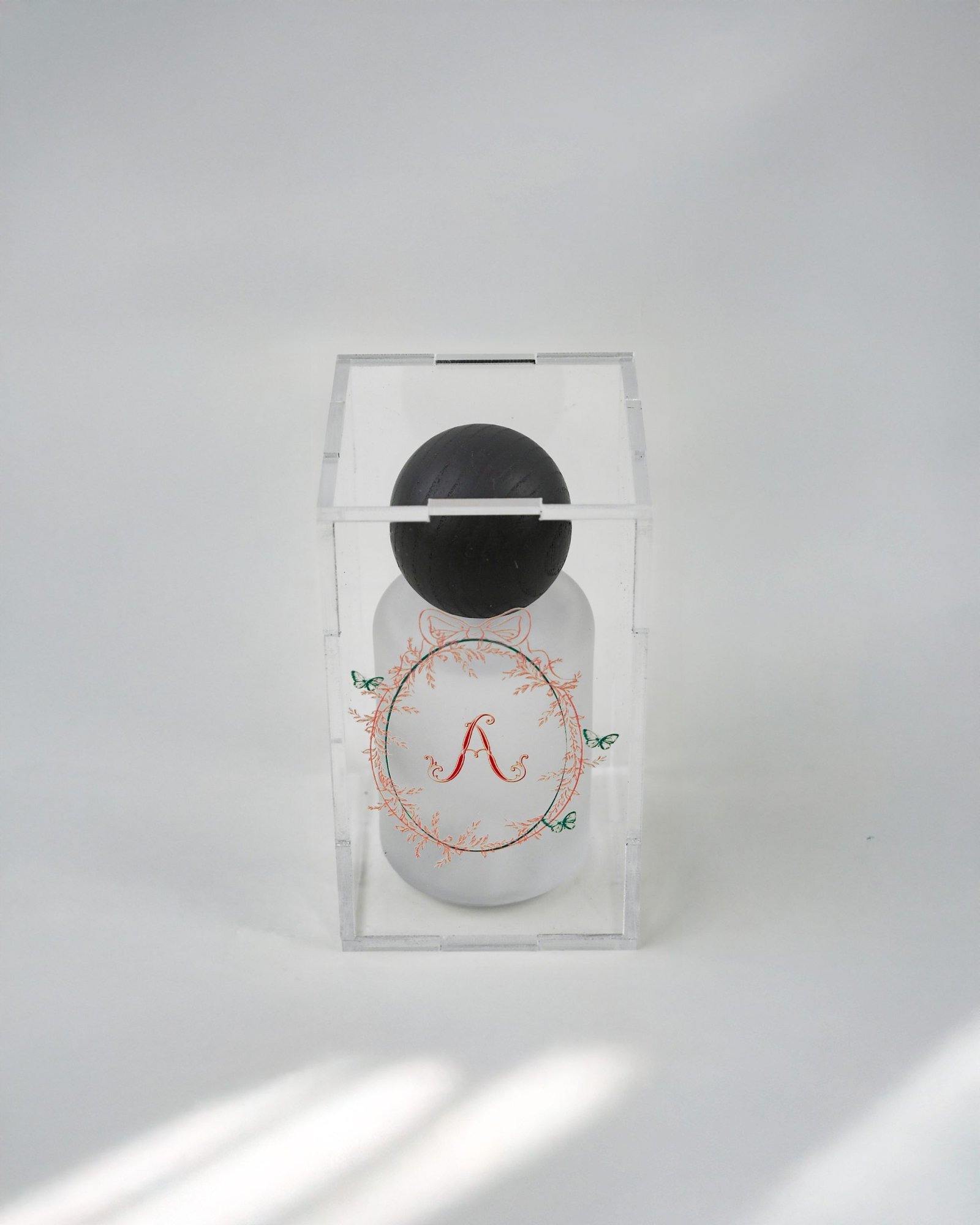 Perfume in acrylic box