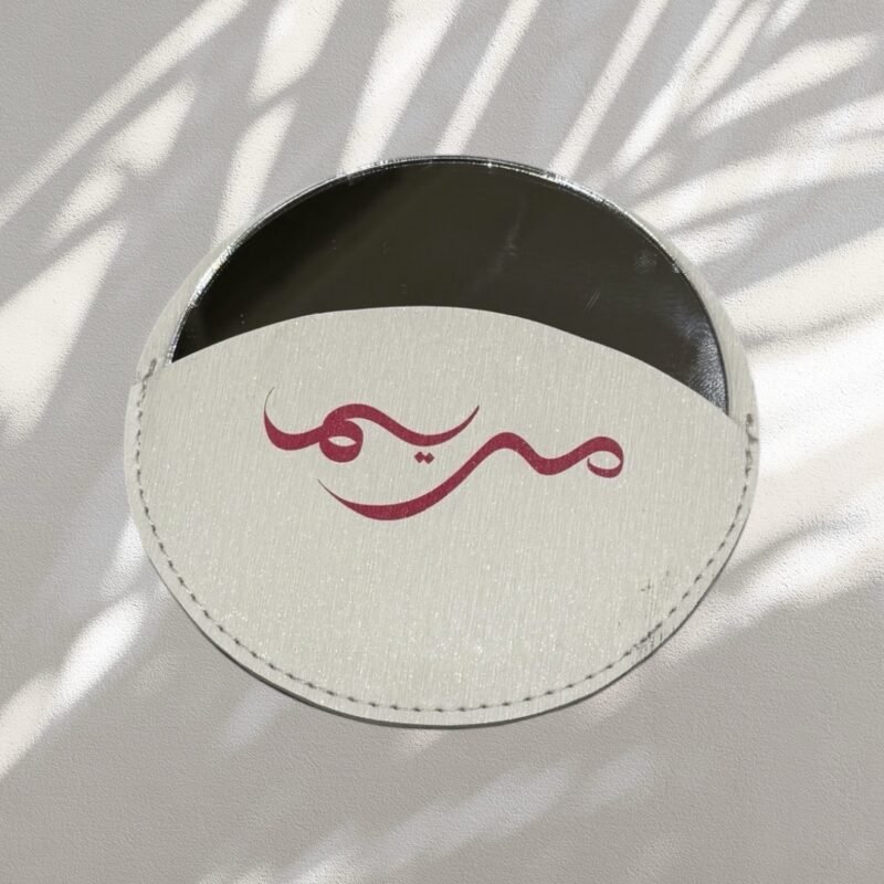 Mirror in leather pouch